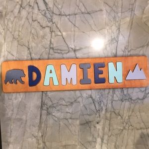 Wooden letter name puzzle